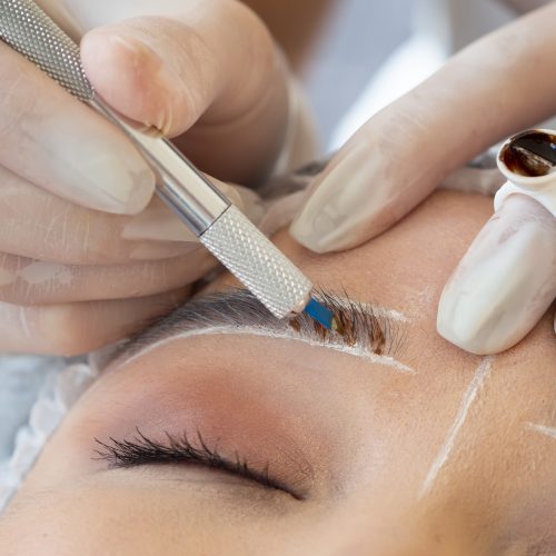 young-woman-going-through-microblading-procedure Microblading Treatment